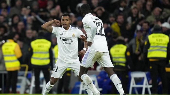 Real Madrids Rodrygo celebrates after scoring his sides first goal during the Spanish Copa del Rey quarter final soccer match between Real Madrid and Atletico Madrid at Santiago Bernabeu stadium in Madrid, Thursday, Jan. 26, 2023. (AP Photo/Bernat Armangue)