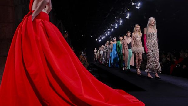 A model wears a creation as part of the Valentino Haute Couture Spring-Summer 2023 collection presented in Paris, Wednesday, Jan. 25, 2023. (AP Photo/Lewis Joly)