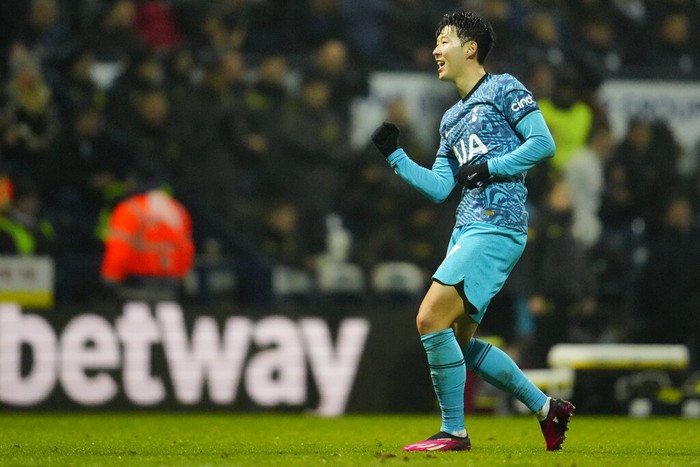 Tottenhams Son Heung-min celebrates after scoring his sides second goal during the FA Cup 4th round soccer match between Preston North End and Tottenham Hotspur at the Deepdale Stadium in Preston, England, Saturday, Jan. 28, 2023. (AP Photo/Jon Super)
