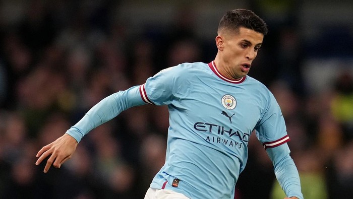 LONDON, ENGLAND - JANUARY 05: Joao Cancelo of Manchester City runs with the ball during the Premier League match between Chelsea FC and Manchester City at Stamford Bridge on January 05, 2023 in London, England. (Photo by Matt McNulty - Manchester City/Manchester City FC via Getty Images)