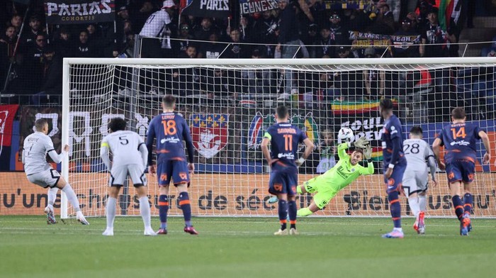 Kylian Mbappe Montpellier's goalkeeper Benjamin Lecomte (4thR) saves a penalty kicked by Paris Saint-Germain's French forward Kylian Mbappe (L) during the French L1 football match between Montpellier Herault SC and Paris Saint-Germain (PSG) at Stade de la Mosson in Montpellier, southern France on February 1, 2023. (Photo by Pascal GUYOT / AFP) (Photo by PASCAL GUYOT/AFP via Getty Images)