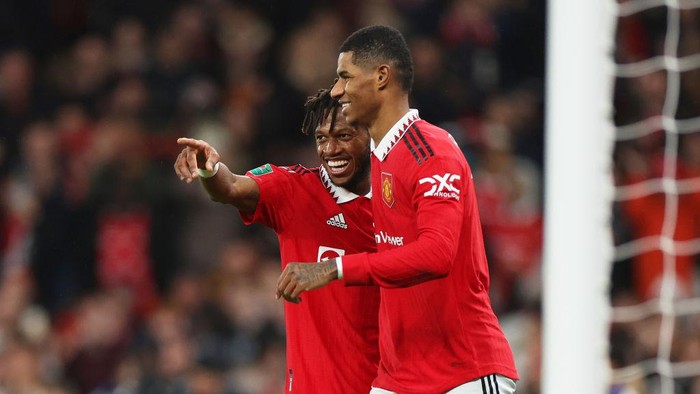 MANCHESTER, ENGLAND - FEBRUARY 01: Fred celebrates with Marcus Rashford of Manchester United after scoring the teams second goal during the Carabao Cup Semi Final 2nd Leg match between Manchester United and Nottingham Forest at Old Trafford on February 01, 2023 in Manchester, England. (Photo by Catherine Ivill/Getty Images)