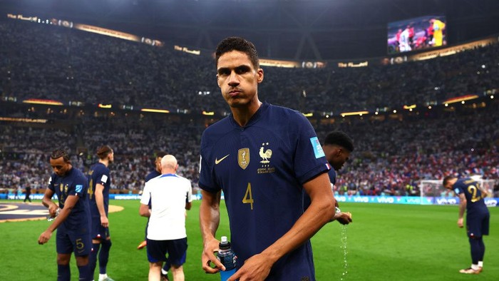 LUSAIL CITY, QATAR - DECEMBER 18: Raphael Varane of France takes a drink before the FIFA World Cup Qatar 2022 Final match between Argentina and France at Lusail Stadium on December 18, 2022 in Lusail City, Qatar. (Photo by Chris Brunskill/Fantasista/Getty Images)