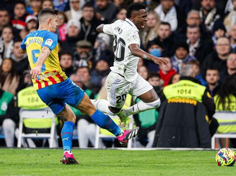 MADRID, SPAIN - FEBRUARY 02: Vinicius Jr. player of Real Madrid receives a foul during the LaLiga Santander match between Real Madrid CF and Valencia CF at Estadio Santiago Bernabeu on February 02, 2023 in Madrid, Spain. (Photo by Antonio Villalba/Real Madrid via Getty Images)