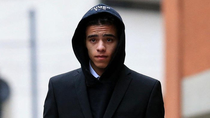 England and Manchester United footballer Mason Greenwood leaves Minshull Street Crown Court in Manchester on November 21, 2022 after a preliminary hearing on charges of attempted rape, controlling and coercive behaviour, and assault. - The 21-year-old was first arrested in January over allegations relating to a young woman after images and videos were posted online. All three charges relate to the same complainant. (Photo by Lindsey Parnaby / AFP) (Photo by LINDSEY PARNABY/AFP via Getty Images)