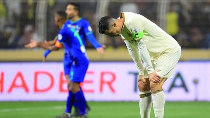 Cristiano Ronaldo Nassr's Portuguese forward Cristiano Ronaldo reacts the Saudi Pro League football match between Al-Fateh and Al-Nassr at the Prince Abdullah bin Jalawi Stadium in al-Hasa on February 3, 2023. (Photo by Ali ALDAIF / AFP)