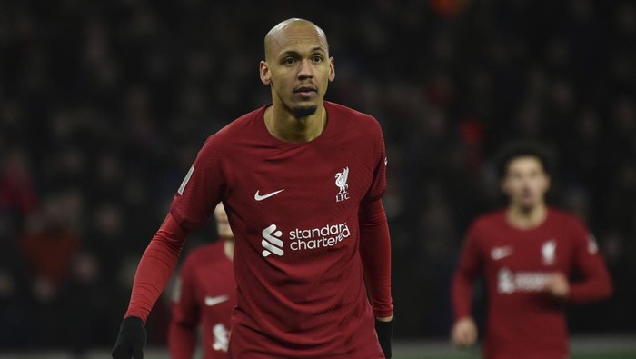 Liverpools Fabinho, left, stands on the pitch during the English FA Cup 3rd round replay soccer match between Wolverhampton Wanderers and Liverpool at Molineux stadium in Wolverhampton, England, Tuesday Jan. 17, 2023. (AP Photo/Rui Vieira)