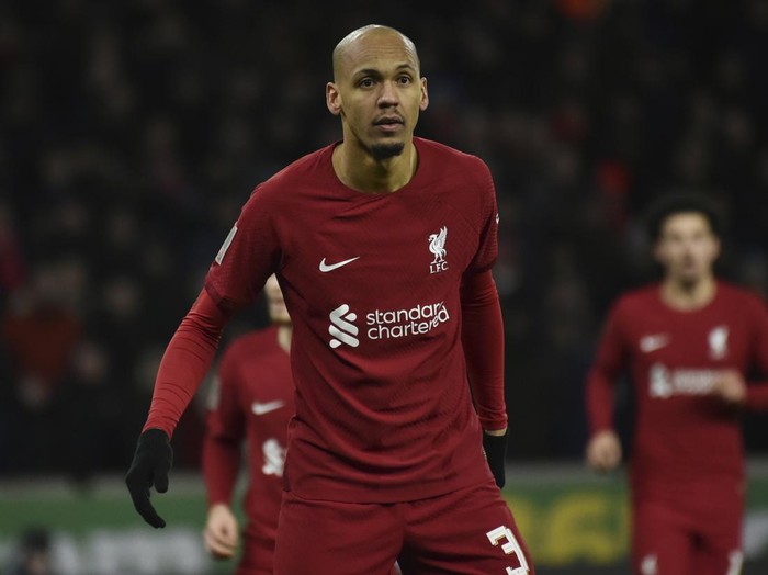 Liverpool's Fabinho, left, stands on the pitch during the English FA Cup 3rd round replay soccer match between Wolverhampton Wanderers and Liverpool at Molineux stadium in Wolverhampton, England, Tuesday Jan. 17, 2023. (AP Photo/Rui Vieira)