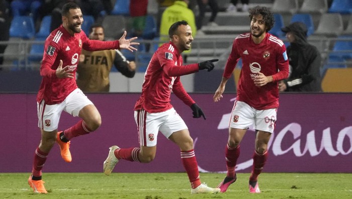 Al Ahly players celebrate after Al Ahlys Mohamed Afsha, centre, scored his sides opening goal during the FIFA Club World Cup soccer match between Seattle Sounders FC and Al Ahly FC in Tangier, Morocco, Saturday, Feb. 4, 2023. (AP Photo/Mosaab Elshamy)