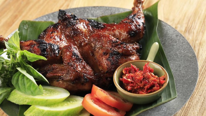 1385476906 Bakakak Hayam or Ayam Bekakak or Grilled Whole Chicken Seasoning with Soy Sauce. Dish from West Java and Jakarta, Indonesia. Close Up