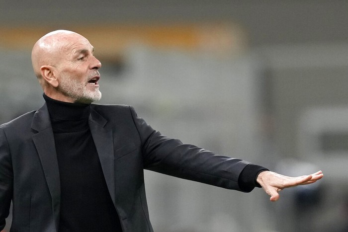 AC Milans manager Stefano Pioli gives instructions to his players during the Serie A soccer match between Inter Milan and AC Milan at the San Siro Stadium, in Milan, Italy, Sunday, Feb. 5, 2023. (AP Photo/Antonio Calanni)