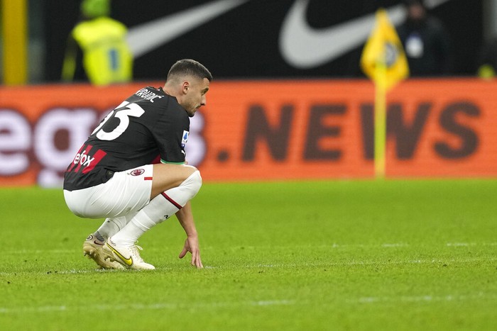 AC Milans Rade Krunic reacts at the end of the Serie A soccer match between Inter Milan and AC Milan at the San Siro Stadium, in Milan, Italy, Sunday, Feb. 5, 2023. (AP Photo/Antonio Calanni)