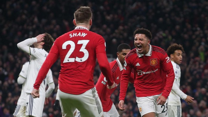 MANCHESTER, ENGLAND - FEBRUARY 08: Jadon Sancho of Manchester United celebrates scoring their second goal during the Premier League match between Manchester United and Leeds United at Old Trafford on February 08, 2023 in Manchester, England. (Photo by Matthew Peters/Manchester United via Getty Images)