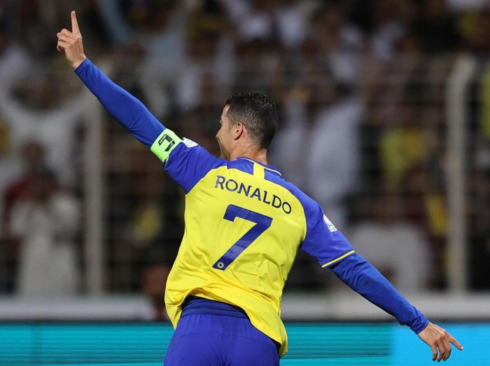 Nassr's Portuguese forward Cristiano Ronaldo celebrates scoring his team's fourth goal the Saudi Pro League football match between Al-Wehda and Al-Nassr at the King Abdulaziz Stadium in Mecca on February 9, 2023. (Photo by AFP) (Photo by -/AFP via Getty Images)