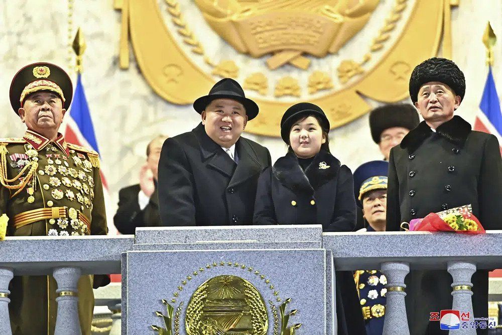 In this photo provided by the North Korean government, North Korean leader Kim Jong Un, center left, with his daughter attends a military parade to mark the 75th founding anniversary of the Korean People’s Army on Kim Il Sung Square in Pyongyang, North Korea Wednesday, Feb. 8, 2023. Independent journalists were not given access to cover the event depicted in this image distributed by the North Korean government. The content of this image is as provided and cannot be independently verified. Korean language watermark on image as provided by source reads: 