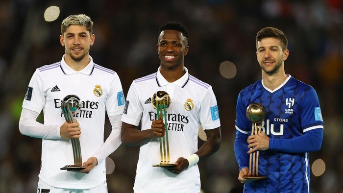 RABAT, MOROCCO - FEBRUARY 11: (L-R) Federico Valverde of Real Madrid poses with the FIFA Club World Cup Morocco 2022 Adidas Silver Ball Award, Vinicius Junior of Real Madrid poses with the FIFA Club World Cup Morocco 2022 Adidas Golden Ball Award and Luciano Vietto of Al Hihal poses with the FIFA Club World Cup Morocco 2022 Adidas Bronze Ball Award  after the FIFA Club World Cup Morocco 2022 Final match between Real Madrid and Al Hilal at Prince Moulay Abdellah on February 11, 2023 in Rabat, Morocco. (Photo by Michael Steele/Getty Images)