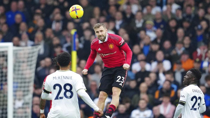Manchester Uniteds Luke Shaw heads the ball during the English Premier League soccer match between Leeds United and Manchester United at Elland Road, Leeds, England, Sunday, Feb.12, 2023. (AP Photo/Jon Super)