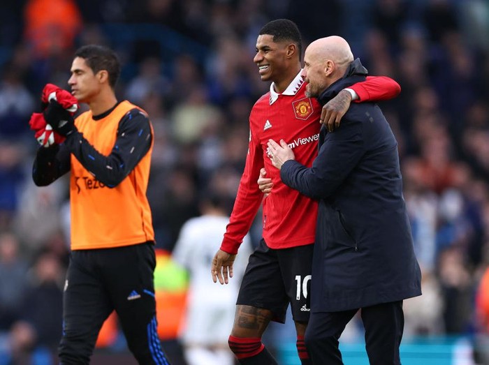 LEEDS, ENGLAND - FEBRUARY 12: Erik Ten Hag the manager / head coach of Manchester United and and Marcus Rashford of Manchester United celebrate at full time during the Premier League match between Leeds United and Manchester United at Elland Road on February 12, 2023 in Leeds, United Kingdom. (Photo by Robbie Jay Barratt - AMA/Getty Images)