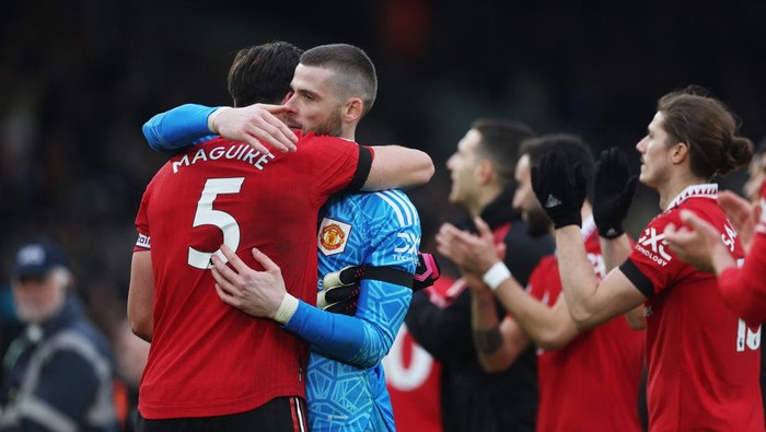 Soccer Football - Premier League - Leeds United v Manchester United - Elland Road, Leeds, Britain - February 12, 2023 Manchester Uniteds Harry Maguire and David de Gea celebrate after the match Action Images via Reuters/Lee Smith EDITORIAL USE ONLY. No use with unauthorized audio, video, data, fixture lists, club/league logos or live services. Online in-match use limited to 75 images, no video emulation. No use in betting, games or single club /league/player publications.  Please contact your account representative for further details.