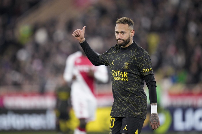PSGs Neymar gestures during a French League One soccer match between Monaco and Paris Saint-Germain at the Stade Louis II in Monaco, Saturday, Feb. 11, 2023. (AP Photo/Daniel Cole)