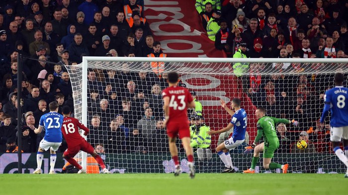 Soccer Football - Premier League - Liverpool v Everton - Anfield, Liverpool, Britain - February 13, 2023 Liverpools Cody Gakpo scores their second goal REUTERS/Carl Recine EDITORIAL USE ONLY. No use with unauthorized audio, video, data, fixture lists, club/league logos or live services. Online in-match use limited to 75 images, no video emulation. No use in betting, games or single club /league/player publications.  Please contact your account representative for further details.