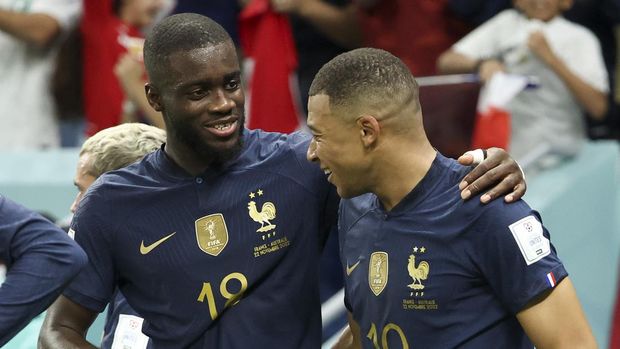AL WAKRAH, QATAR - NOVEMBER 22: Kylian Mbappe of France celebrates with Dayot Upamecano of France (L) after putting his side 3-1 ahead during the FIFA World Cup Qatar 2022 Group D match between France and Australia at Al Janoub Stadium on November 22, 2022 in Al Wakrah, Qatar. (Photo by Jean Catuffe/Getty Images)
