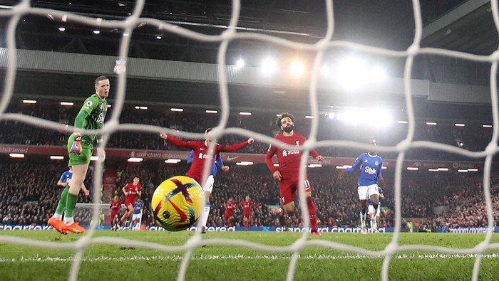 Mohamed Salah, Liverpool vs Everton Soccer Football - Premier League - Liverpool v Everton - Anfield, Liverpool, Britain - February 13, 2023 Liverpool's Mohamed Salah celebrates scoring their first goal as Everton's Jordan Pickford looks dejected REUTERS/Carl Recine EDITORIAL USE ONLY. No use with unauthorized audio, video, data, fixture lists, club/league logos or 'live' services. Online in-match use limited to 75 images, no video emulation. No use in betting, games or single club /league/player publications. Please contact your account representative for further details.
