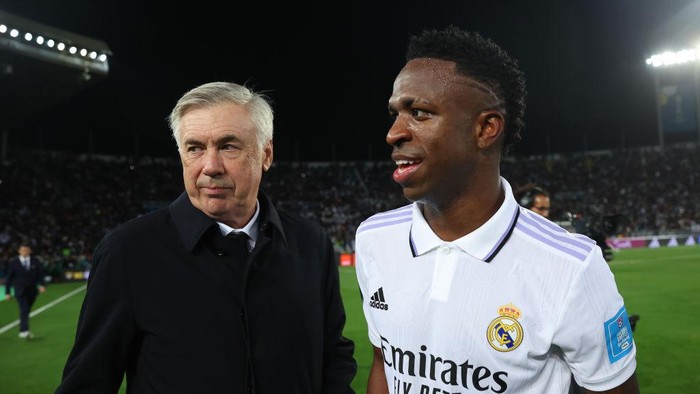 RABAT, MOROCCO - FEBRUARY 11: Carlo Ancelotti, Head Coach of Real Madrid, and Vinicius Junior react after the FIFA Club World Cup Morocco 2022 Final match between Real Madrid and Al Hilal at Prince Moulay Abdellah on February 11, 2023 in Rabat, Morocco. (Photo by Alex Grimm - FIFA/FIFA via Getty Images)