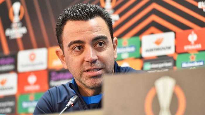 Barcelonas Spanish coach Xavi gives a press conference on the eve of their UEFA Europa League play-offs football match against Manchester United at the Joan Gamper training ground in Sant Joan Despi, near Barcelona, on February 15, 2023. (Photo by Pau BARRENA / AFP) (Photo by PAU BARRENA/AFP via Getty Images)