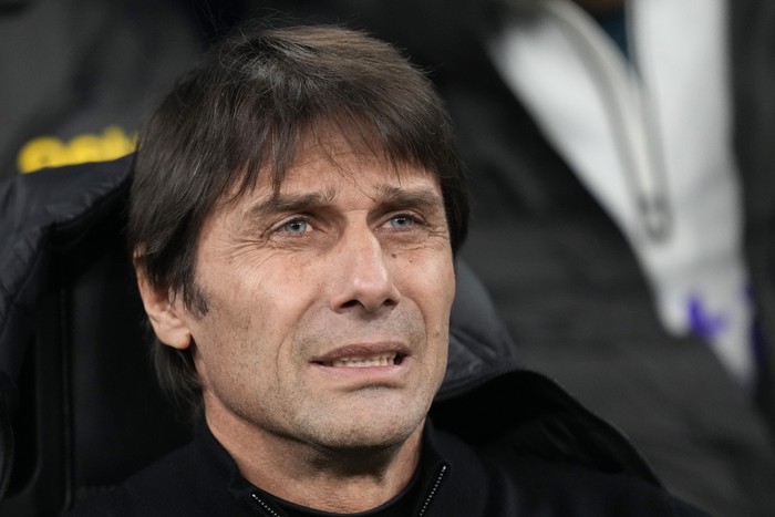 Tottenhams head coach Antonio Conte attends the Champions League, round of 16, first leg soccer match between AC Milan and Tottenham Hotspur at the San Siro stadium in Milan , Italy, Tuesday, Feb. 14, 2023. (AP Photo/Luca Bruno)