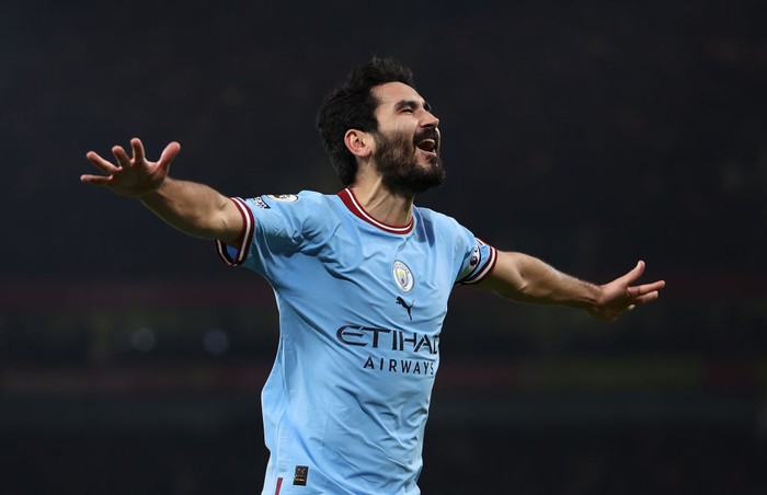 LONDON, ENGLAND - FEBRUARY 15: Ilkay Guendogan of Manchester City celebrates after Erling Haaland of Manchester City ( not pictured ) scores their sides third goal during the Premier League match between Arsenal FC and Manchester City at Emirates Stadium on February 15, 2023 in London, England. (Photo by Julian Finney/Getty Images)