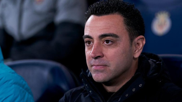 VILLARREAL, SPAIN - FEBRUARY 12: Xavi Hernandez, head coach of FC Barcelona looks on prior to the LaLiga Santander match between Villarreal CF and FC Barcelona at Estadio de la Ceramica on February 12, 2023 in Villarreal, Spain. (Photo by Mateo Villalba/Quality Sport Images/Getty Images)