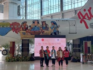 Ada F1 PowerBoat, AirAsia Luncurkan Pesawat Bercorak Danau Toba Ada F1 PowerBoat, AirAsia Luncurkan Pesawat Bercorak Danau Toba