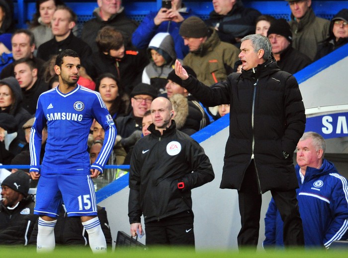 Chelseas Portuguese manager Jose Mourinho (R) gives instructions to Chelseas Egyptian midfielder Mohamed Salah (L) during the English Premier League football match between Chelsea and Newcastle United at Stamford Bridge in west London on February 8, 2014. Chelsea won the game 3-0. AFP PHOTO / GLYN KIRK

RESTRICTED TO EDITORIAL USE. No use with unauthorized audio, video, data, fixture lists, club/league logos or live services. Online in-match use limited to 45 images, no video emulation. No use in betting, games or single club/league/player publications.        (Photo credit should read GLYN KIRK/AFP via Getty Images)