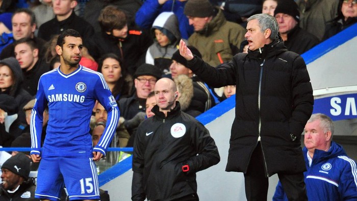 Chelseas Portuguese manager Jose Mourinho (R) gives instructions to Chelseas Egyptian midfielder Mohamed Salah (L) during the English Premier League football match between Chelsea and Newcastle United at Stamford Bridge in west London on February 8, 2014. Chelsea won the game 3-0. AFP PHOTO / GLYN KIRK

RESTRICTED TO EDITORIAL USE. No use with unauthorized audio, video, data, fixture lists, club/league logos or live services. Online in-match use limited to 45 images, no video emulation. No use in betting, games or single club/league/player publications.        (Photo credit should read GLYN KIRK/AFP via Getty Images)