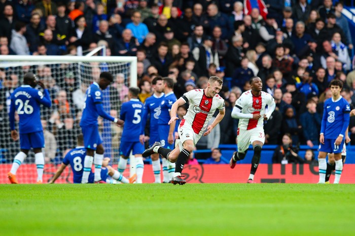 LONDON, ENGLAND - FEBRUARY 18: James Ward-Prowse of Southampton celebrates scoring the opening goal during the Premier League match between Chelsea FC and Southampton FC at Stamford Bridge on February 18, 2023 in London, United Kingdom. (Photo by Craig Mercer/MB Media/Getty Images)
