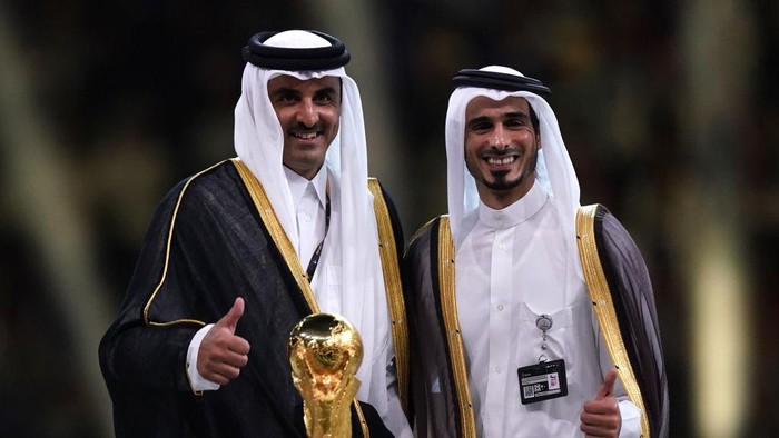 Emir of Qatar Sheikh Tamim bin Hamad al-Thani (left) and Sheikh Jassim bin Hamad al-Thani following the FIFA World Cup Final match at the Lusail Stadium in Lusail, Qatar. Picture date: Sunday December 18, 2022. Picture date: Sunday December 18, 2022. (Photo by Mike Egerton/PA Images via Getty Images)