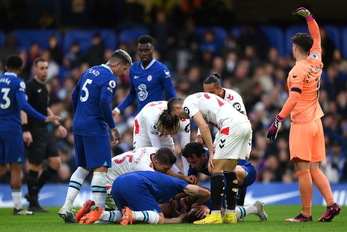LONDON, ENGLAND - FEBRUARY 18: Chelseas Ben Chilwell and Chelseas Benoit Badiashile react to team mate Cesar Azpilicuetas injury during the Premier League match between Chelsea FC and Southampton FC at Stamford Bridge on February 18, 2023 in London, United Kingdom. (Photo by Stephanie Meek - CameraSport via Getty Images)
