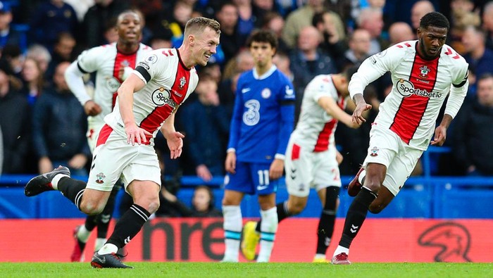 LONDON, ENGLAND - FEBRUARY 18: James Ward-Prowse of Southampton celebrates scoring the opening goal during the Premier League match between Chelsea FC and Southampton FC at Stamford Bridge on February 18, 2023 in London, United Kingdom. (Photo by Craig Mercer/MB Media/Getty Images)