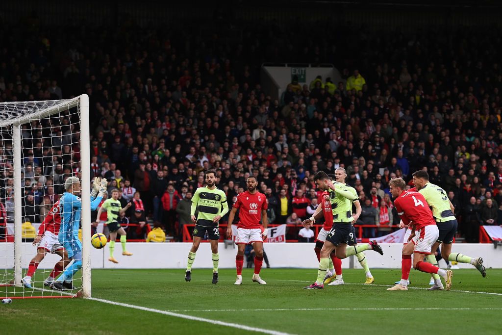 NOTTINGHAM, ENGLAND - FEBRUARY 18: Keylor Navas of Nottingham Forest saves a shot from Aymeric Laporte of Manchester City during the Premier League match between Nottingham Forest and Manchester City at City Ground on February 18, 2023 in Nottingham, England. (Photo by Michael Regan/Getty Images)
