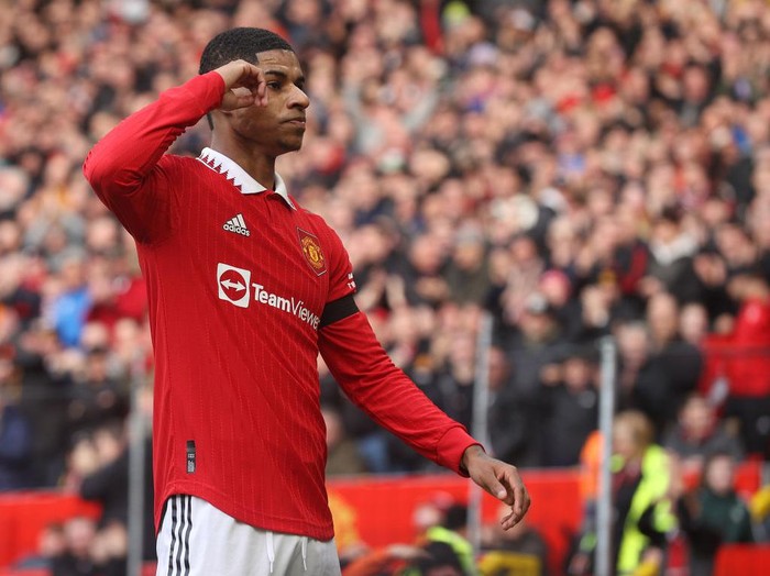 MANCHESTER, ENGLAND - FEBRUARY 19: Marcus Rashford of Manchester United celebrates scoring their first goal during the Premier League match between Manchester United and Leicester City at Old Trafford on February 19, 2023 in Manchester, England. (Photo by Matthew Peters/Manchester United via Getty Images)