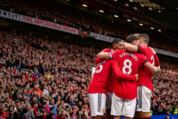 MANCHESTER, ENGLAND - FEBRUARY 19:  Jadon Sancho of Manchester United celebrates scoring a goal to make the score 3-0 with team-mates during the Premier League match between Manchester United and Leicester City at Old Trafford on February 19, 2023 in Manchester, United Kingdom. (Photo by Ash Donelon/Manchester United via Getty Images)