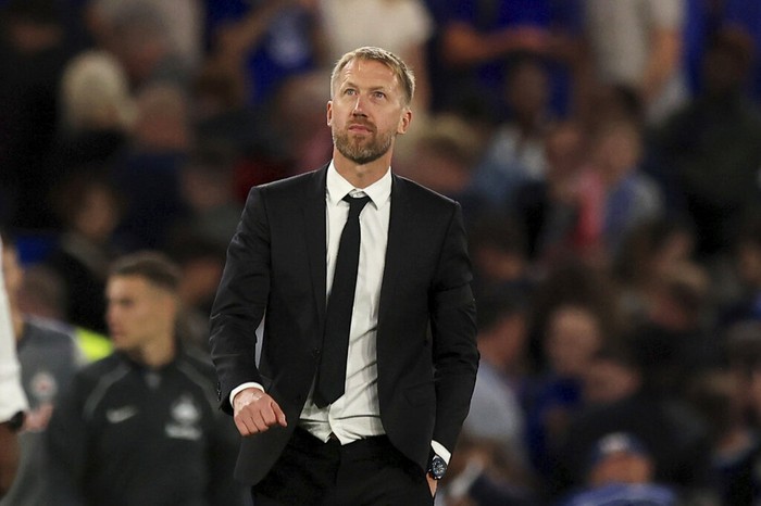 Chelsea Manager Graham Potter watches during the champions League soccer match between Chelsea and Red Bull Salzburg at the Stamford Bridge in London, England, in London , England, Wednesday, Sept. 14, 2022. (AP Photo/Leila Coker)