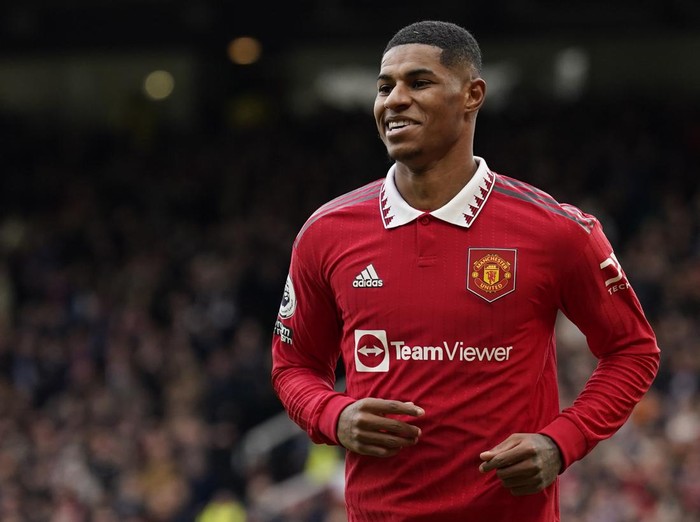 Manchester United's Marcus Rashford celebrates after scoring his side's second goal during the English Premier League soccer match between Manchester United and Leicester City at the Stamford Bridge stadium in Manchester, England, Sunday, Feb. 19, 2023. (AP Photo/Dave Thompson)