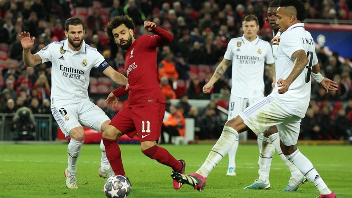 Real Madrid membuktikan sebagai tim berkelas di Liga Champions. Sudah tertinggal dua gol, Los Blancos akhirnya bisa menang 5-2. Liverpool vs Real Madrid berlangsung di Anfield dalam leg pertama 16 besar Liga Champions, Rabu (22/2/2023) dini hari WIB.