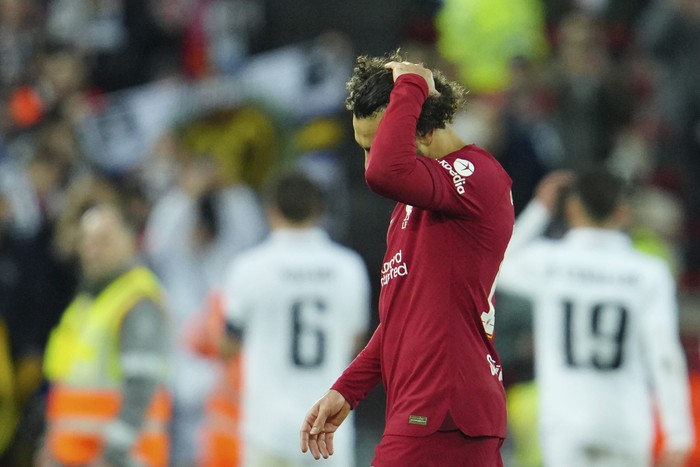 Liverpool's Mohamed Salah gestures at the end of the Champions League, round of 16, first leg soccer match between Liverpool and Real Madrid at the Anfield stadium in Liverpool, England, Tuesday, Feb. 21, 2023. (AP Photo/Jon Super)