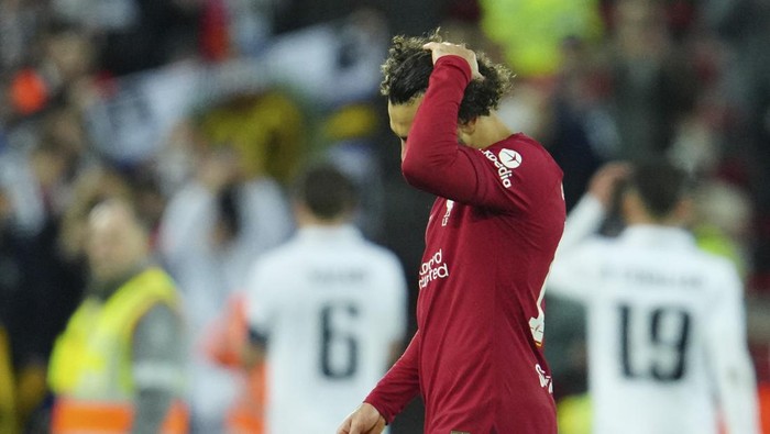 Liverpools Mohamed Salah gestures at the end of the Champions League, round of 16, first leg soccer match between Liverpool and Real Madrid at the Anfield stadium in Liverpool, England, Tuesday, Feb. 21, 2023. (AP Photo/Jon Super)
