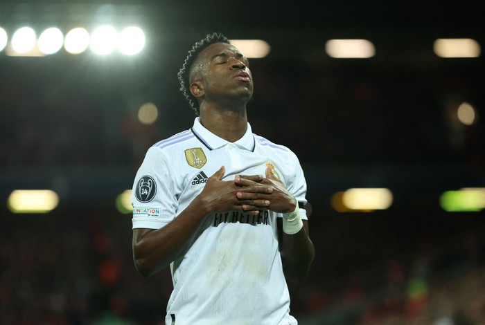 Soccer Football - Champions League - Round of 16 First Leg - Liverpool v Real Madrid - Anfield, Liverpool, Britain - February 21, 2023  Real Madrids Vinicius Junior celebrates scoring their second goal REUTERS/Phil Noble