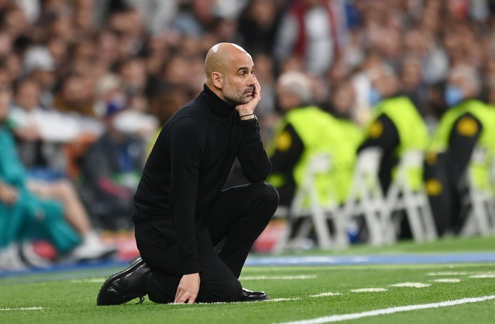 MADRID, SPAIN - MAY 04: Pep Guardiola, Manager of Manchester City reacts during the UEFA Champions League Semi Final Leg Two match between Real Madrid and Manchester City at Estadio Santiago Bernabeu on May 04, 2022 in Madrid, Spain. (Photo by Michael Regan/Getty Images)