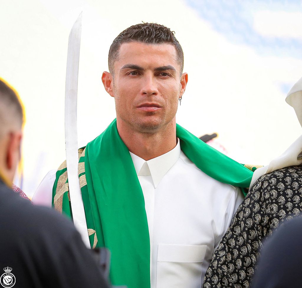 Al-Nassr's Cristiano Ronaldo celebrates Saudi Arabia's Founding Day wearing local traditional clothes at Al-Nassr Football Club in Riyadh, Saudi Arabia, February 22, 2023. Al-Nassr FC/Handout via REUTERS ATTENTION EDITORS - THIS PICTURE WAS PROVIDED BY A THIRD PARTY